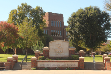 Northeast corner of the NWOSU campus looking at the corner sign, Carter Hall and Jesse Dunn.