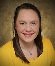 Headshot photo of Emilie Cline, a LASSO Center Student Coach and Academic Advisor