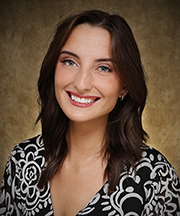 Headshot photo of M'Cheila Rader, a LASSO Center Academic Advisor and Career Coach