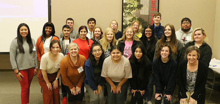 WHS students and sponsor with NWOSU students